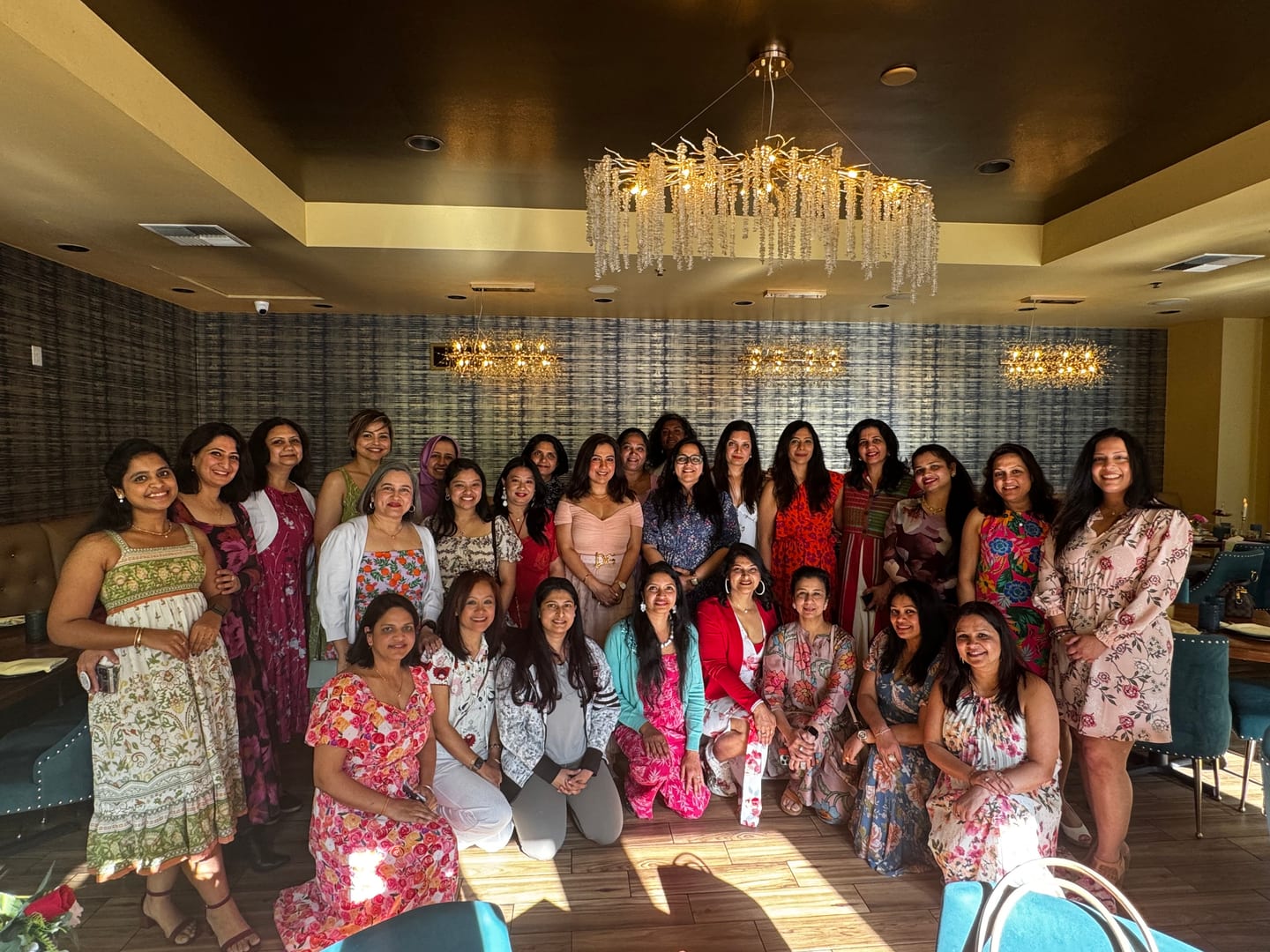 Women gathered for a SAWE Coffee Meet